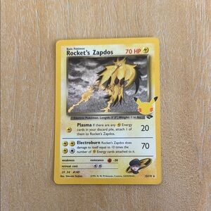 Rocket's Zapdos Celebrations Holo Pokémon Card